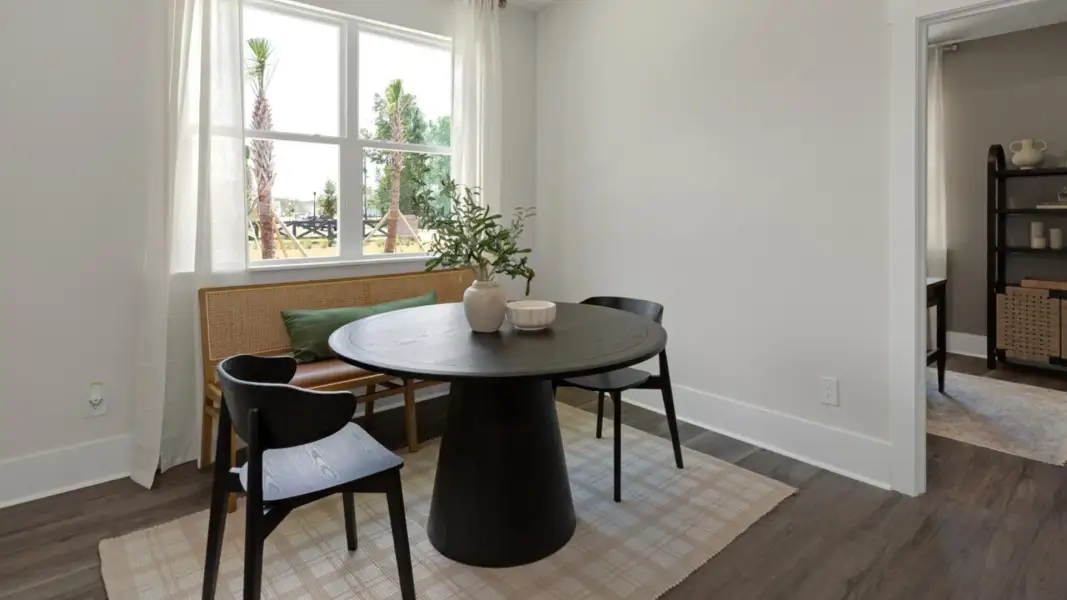 Furnished interior in a model home at The Retreat at Indigo Preserve Townhomes in Leland (Image 12).
