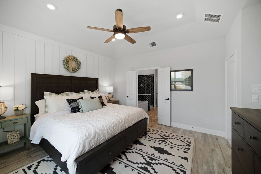 Furnished interior in a model home at Gatherings® at Chambers Creek: Duets in Willis (Image 10).