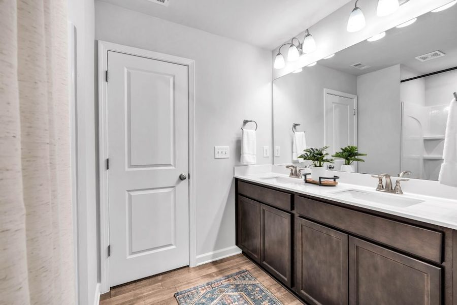 Furnished interior in a model home at The Reserve at Chapel Hill Phase II in Douglasville (Image 16).