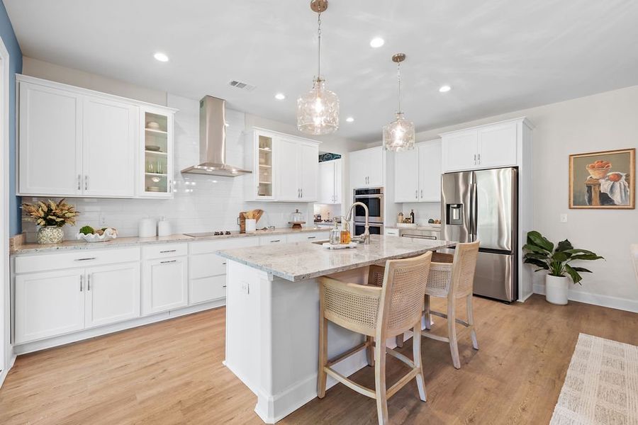 Furnished interior in a model home at Ramsey Landing in Rincon (Image 11).