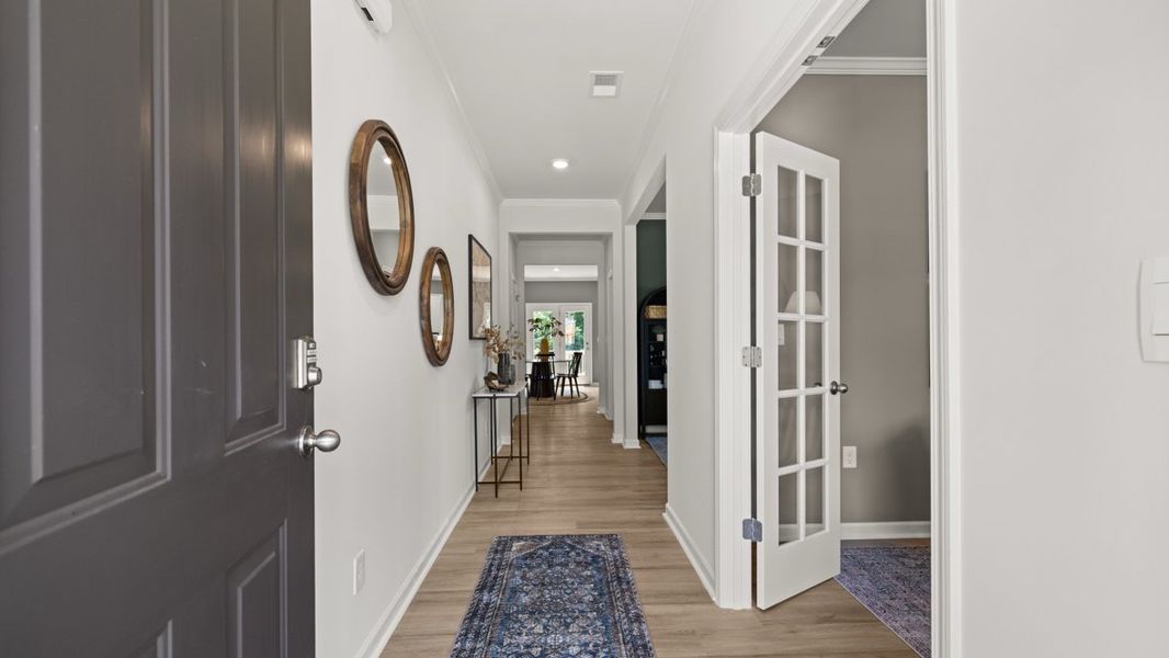 Furnished interior in a model home at Northwoods at Mirror Lake in Villa Rica (Image 8).