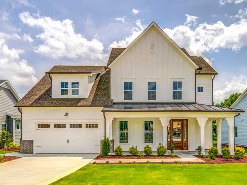 Front exterior of a home in the Cedar Crest - Fuquay-Varina - Robuck Homes community, located in Fuquay Varina, NC (Image 3).
