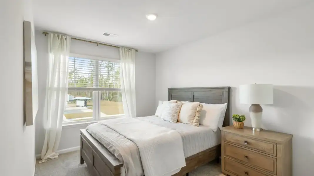 Furnished interior in a model home at Old Bailey Towns in Ridgeland (Image 20).