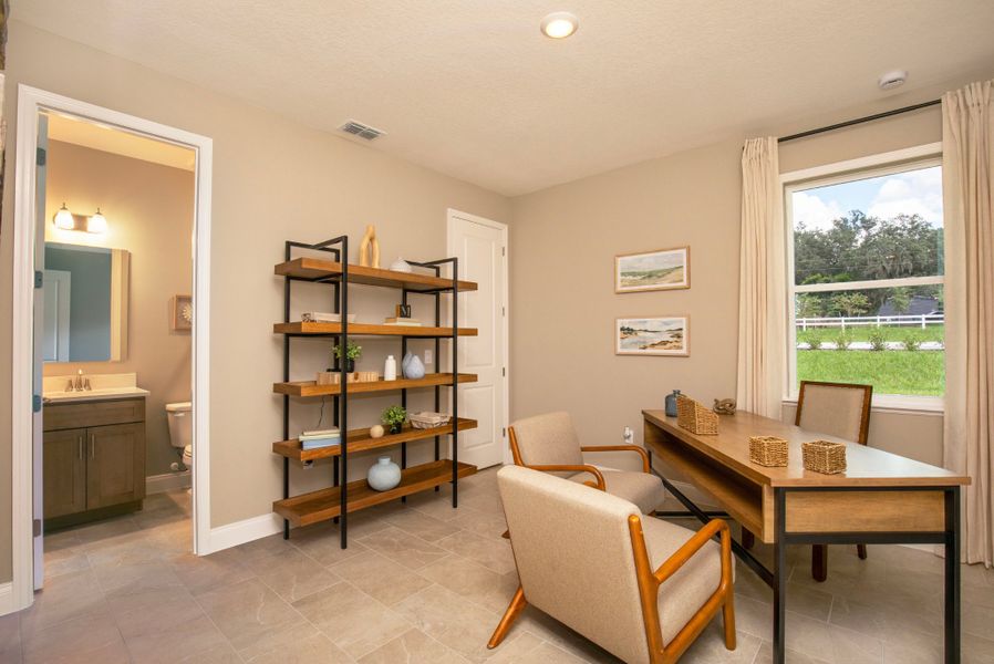 Furnished interior in a model home at Lehigh Acres Premier in Lehigh Acres (Image 10). Furnished interior in a model home at Lehigh Acres Premier in Lehigh Acres (Image 10).