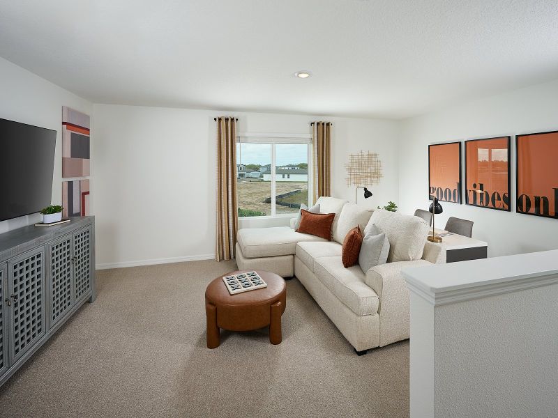 Furnished interior in a model home at Oakfield Trails - Classic Series in Parrish (Image 8).