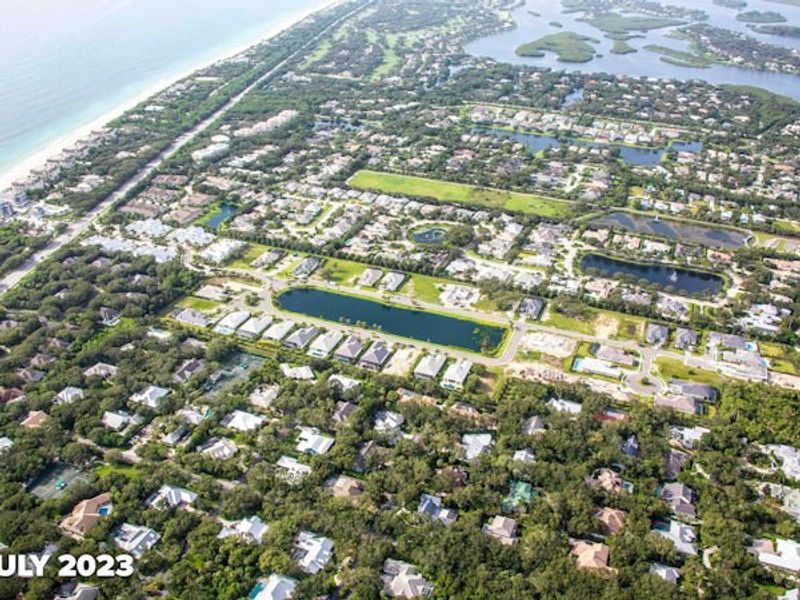 Aerial view of the The Strand community in Vero Beach, FL, showing layout and nearby surroundings (Image 16).