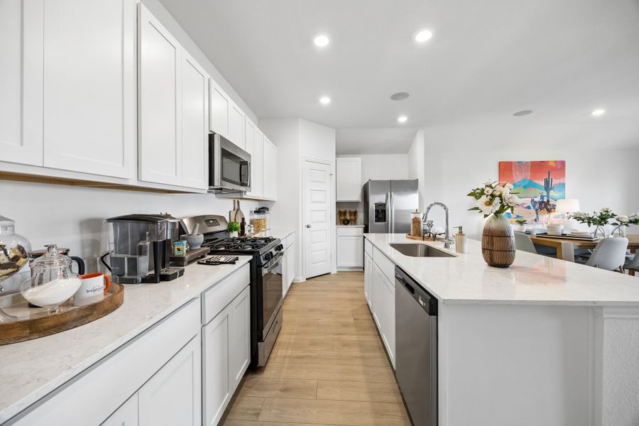 Furnished interior in a model home at Meridiana in Manvel (Image 9).