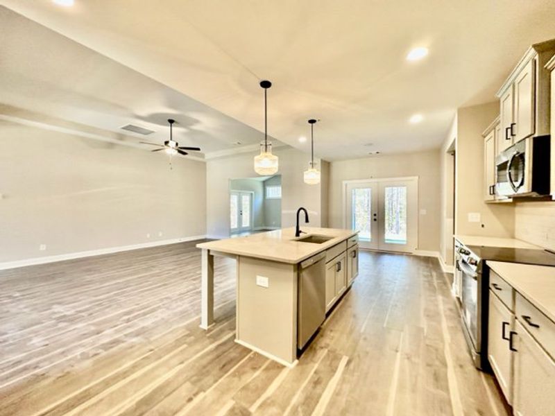 Furnished interior in a model home at Triple Park in Moreland (Image 11).