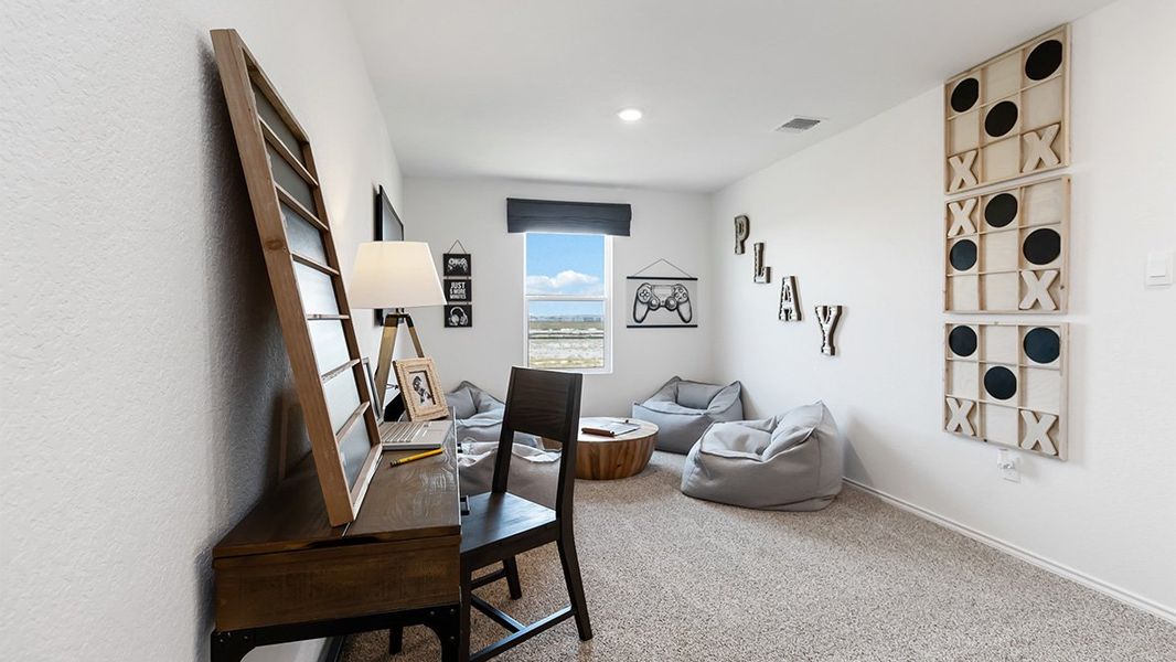 Furnished interior in a model home at Sereno Springs in Converse (Image 22).