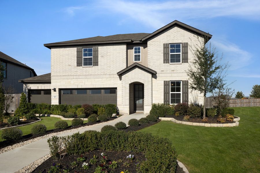 Front exterior of a home in the Venado Crossing community, located in Cibolo, TX (Image 2).