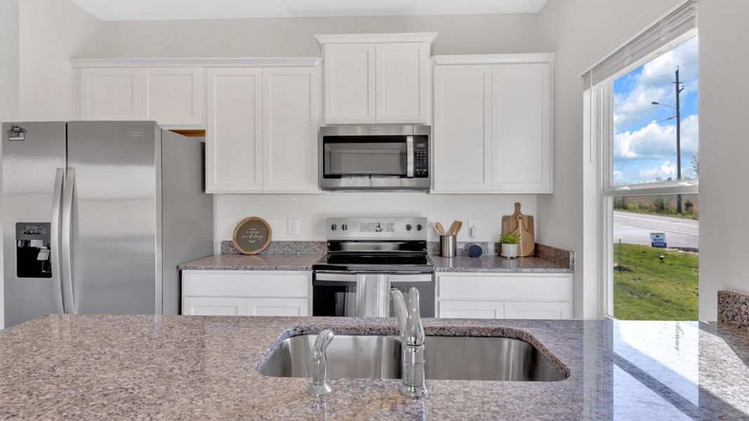 Furnished interior in a model home at Cherokee Crossing in Kodak (Image 34).