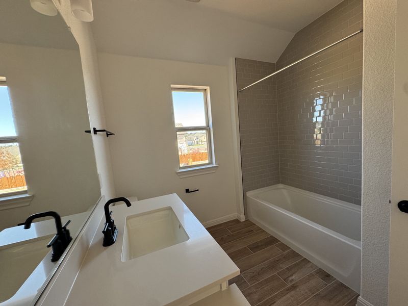 Furnished interior in a model home at Santa Rita Ranch in Liberty Hill (Image 37). Furnished interior in a model home at Santa Rita Ranch in Liberty Hill (Image 37).