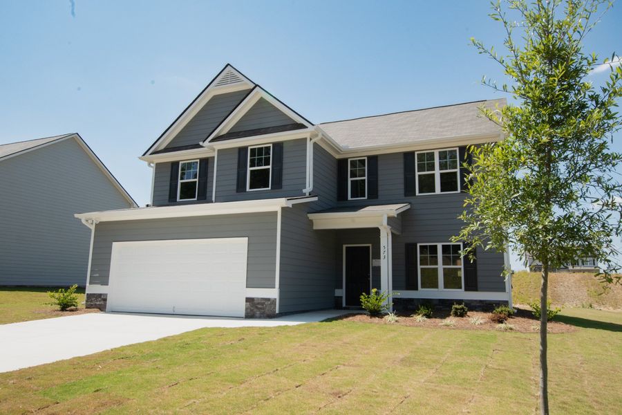 Front exterior of a home in the Creekside Landing community, located in Dallas, GA (Image 3). Front exterior of a home in the Creekside Landing community, located in Dallas, GA (Image 3).