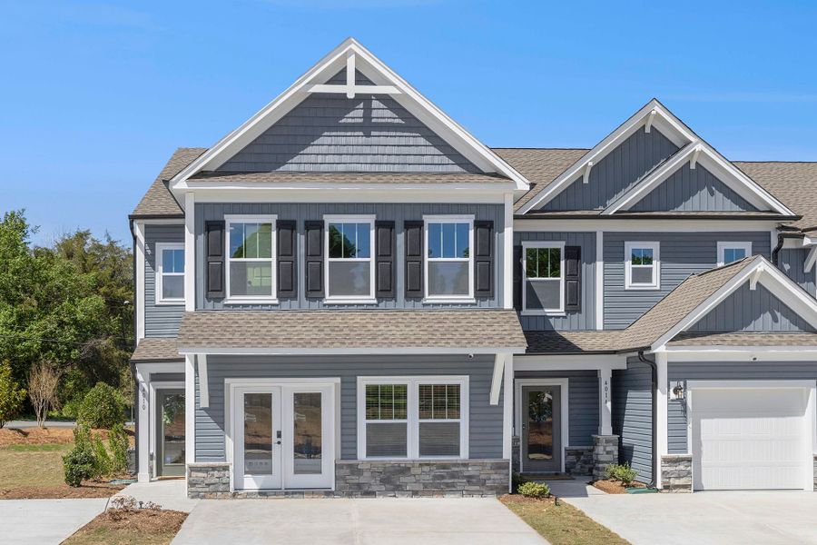 Front exterior of a home in the Grandview Villas Townhomes community, located in Pfafftown, NC (Image 1).