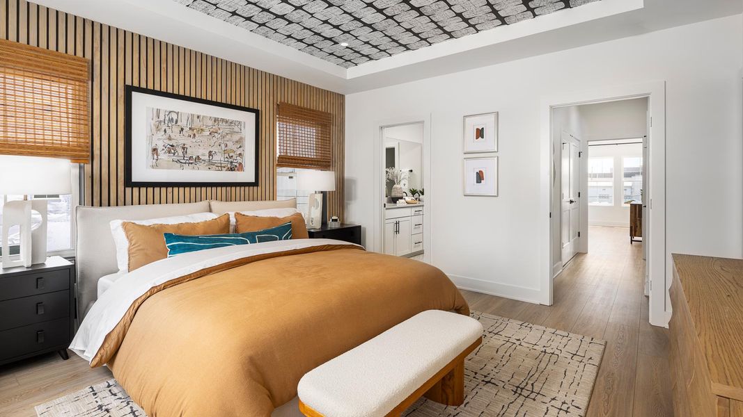 Primary bedroom suites feature a large walk-in closet and lavish bath