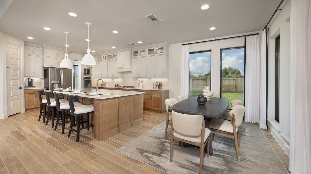 Furnished interior in a model home at Cross Creek West 55' in Fulshear (Image 11).