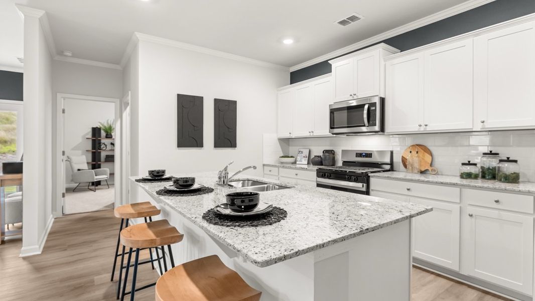 Furnished interior in a model home at Sheffield Highlands in Dallas (Image 8).