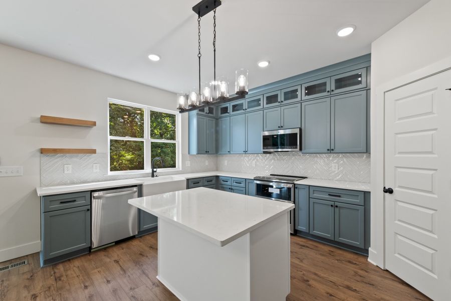 Furnished interior in a model home at Cambria in White House (Image 6).