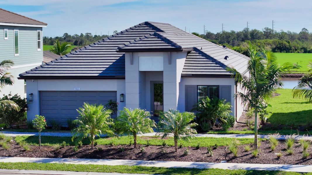 Front exterior of a home in the Palm Grove community, located in Bradenton, FL (Image 19).