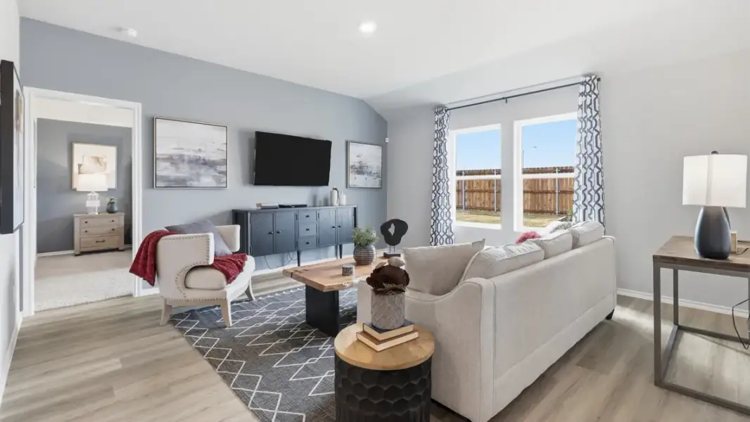 Furnished interior in a model home at Hadley Farms in Godley (Image 7).