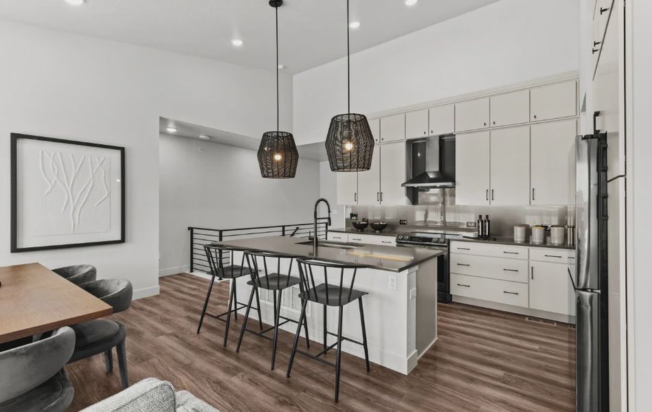 Furnished interior in a model home at Deer Creek in Littleton (Image 9).
