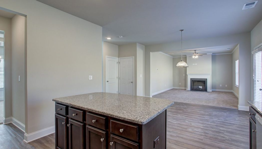 Furnished interior in a model home at North Village in Rydal (Image 7).