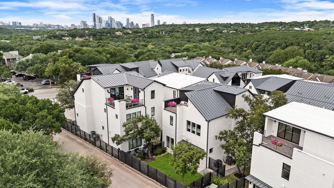 Aerial view of the Spyglass community in Austin, TX, showing layout and nearby surroundings (Image 1). Aerial view of the Spyglass community in Austin, TX, showing layout and nearby surroundings (Image 1).