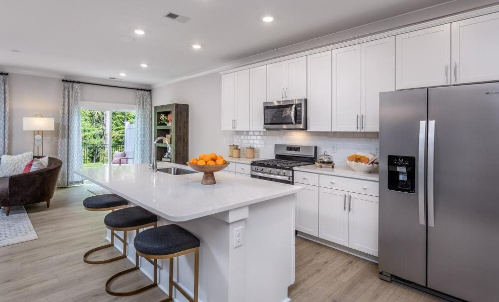 Furnished interior in a model home at Running Brook Townes in Durham (Image 18).