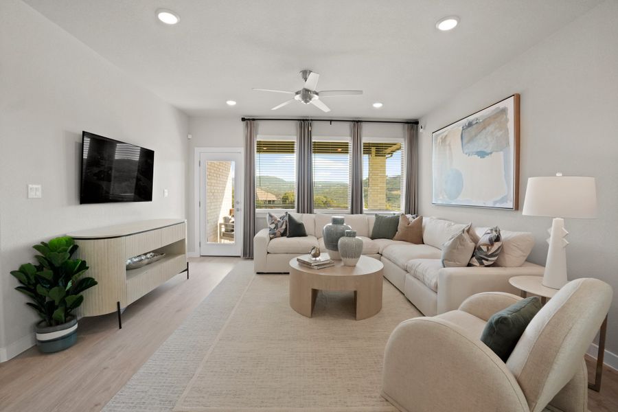 Living Room in the Lakeside at Tessera Willow model home in Lago Vista TX by Trophy Signature Homes