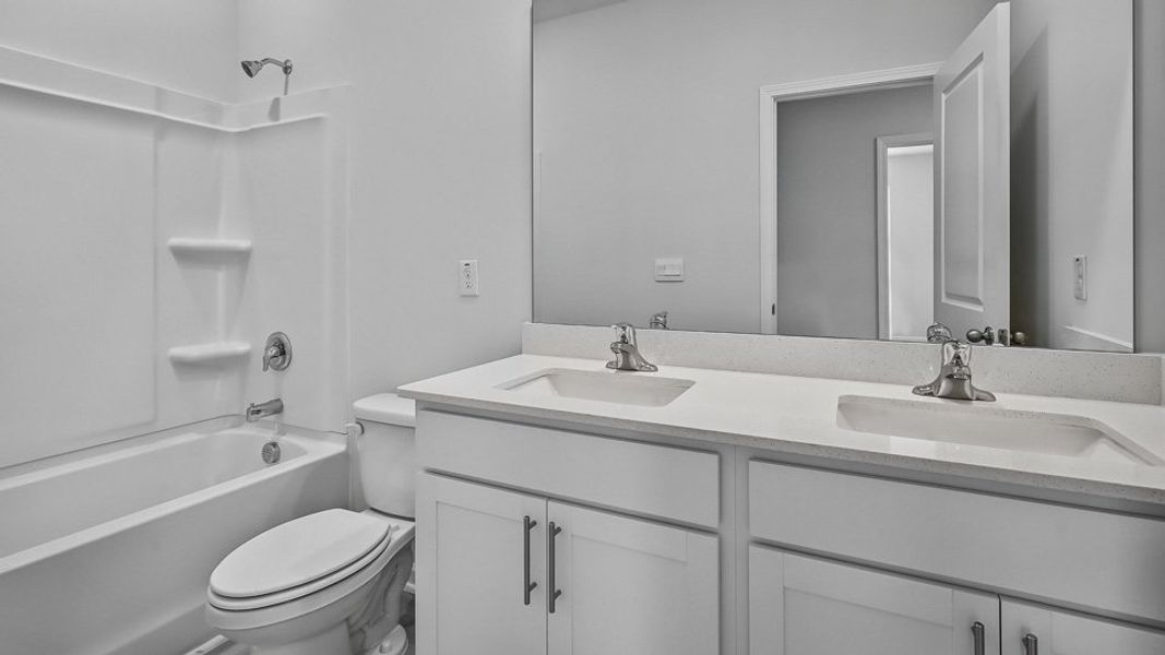 Furnished interior in a model home at The Townes Park in Apex (Image 25). Furnished interior in a model home at The Townes Park in Apex (Image 25).