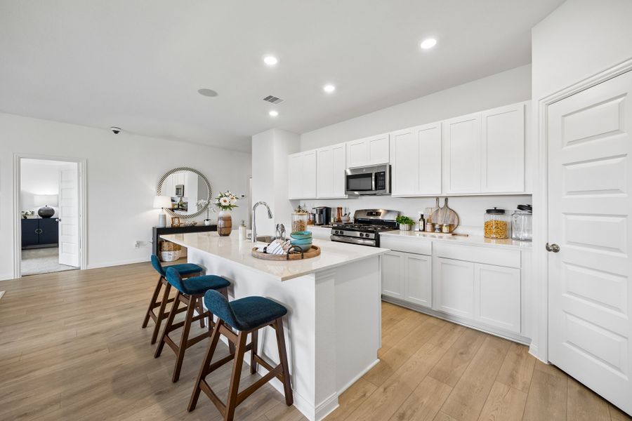 Furnished interior in a model home at Meridiana in Manvel (Image 11).
