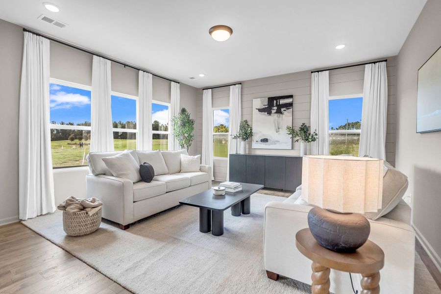 Furnished interior in a model home at Reeves Crossing in St. George (Image 9).