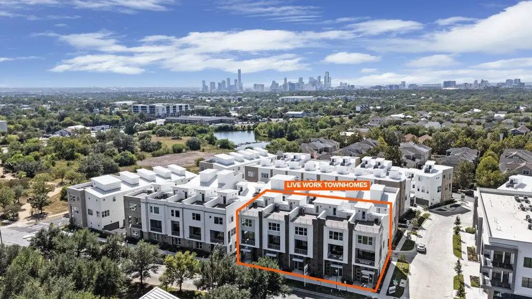 Aerial view of the Austin Modern Lofts at Mueller community in Austin, TX, showing layout and nearby surroundings (Image 1). Aerial view of the Austin Modern Lofts at Mueller community in Austin, TX, showing layout and nearby surroundings (Image 1).