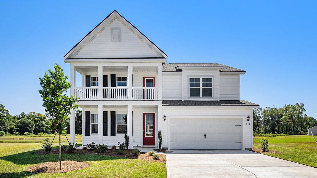 Front exterior of a home in the The Forest at Black Bear community, located in Longs, SC (Image 2).