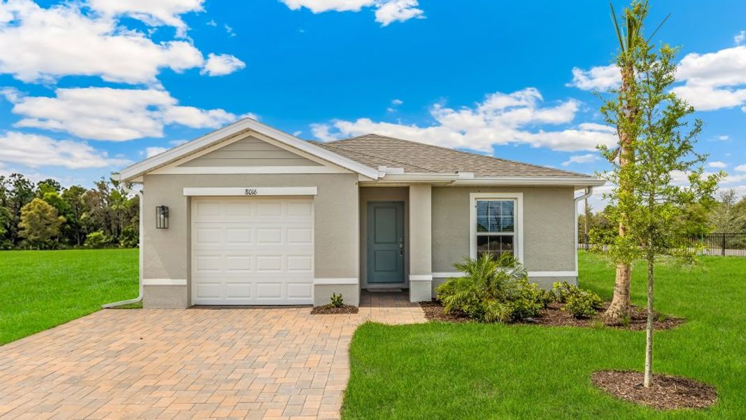 Front exterior of a home in the Asher Park community, located in Lehigh Acres, FL (Image 3). Front exterior of a home in the Asher Park community, located in Lehigh Acres, FL (Image 3).