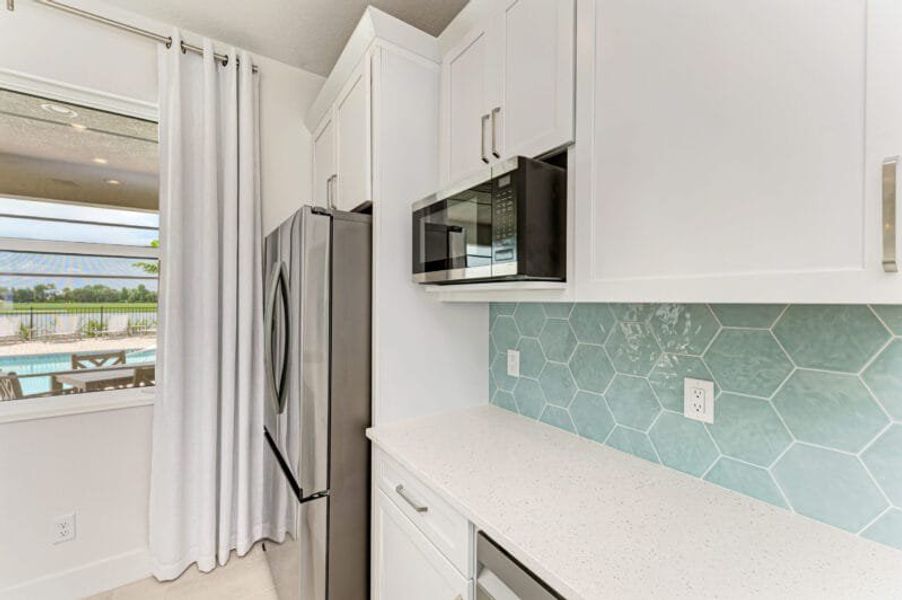 Furnished interior in a model home at The Laurels in Parrish (Image 11).