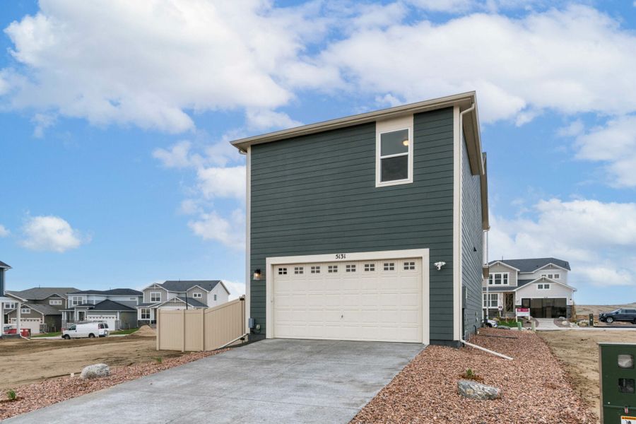 Front exterior of a home in the The Trails at Aspen Ridge – Altitude Collection community, located in Colorado Springs, CO (Image 3).