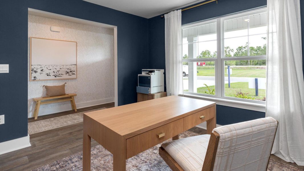 Furnished interior in a model home at Eagle Creek in Bolivia (Image 16).