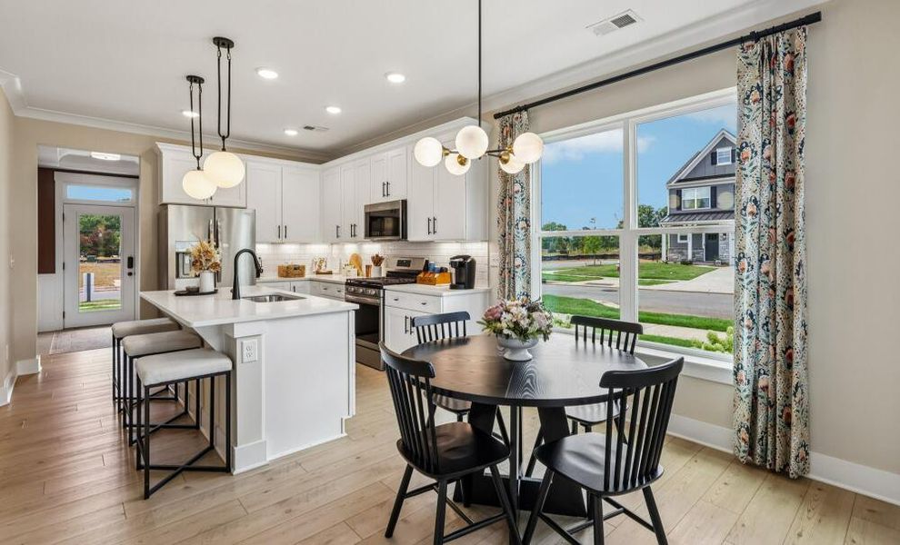 Furnished interior in a model home at Bellevue Townhomes in Greenville (Image 8).