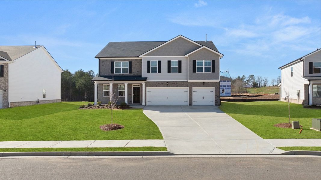 Front exterior of a home in the Bridle Creek community, located in Locust Grove, GA (Image 11). Front exterior of a home in the Bridle Creek community, located in Locust Grove, GA (Image 11).