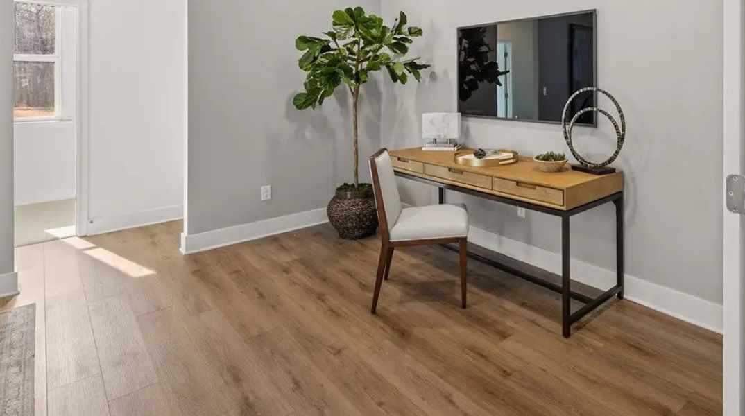 Furnished interior in a model home at Forrest Crossing: Forrest Crossing Single Family in Woodstock (Image 4).