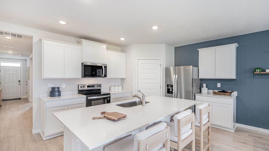 Furnished interior in a model home at Okeechobee Spot Lots in Okeechobee (Image 4).