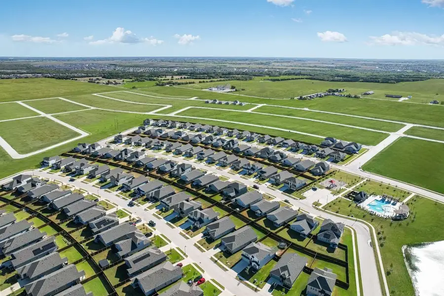 Aerial view of the River Ridge community in Crandall, TX, showing layout and nearby surroundings (Image 1).