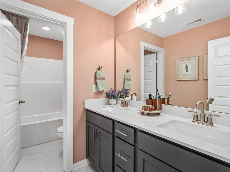 Furnished interior in a model home at Calista Farms in White House (Image 40). Furnished interior in a model home at Calista Farms in White House (Image 40).