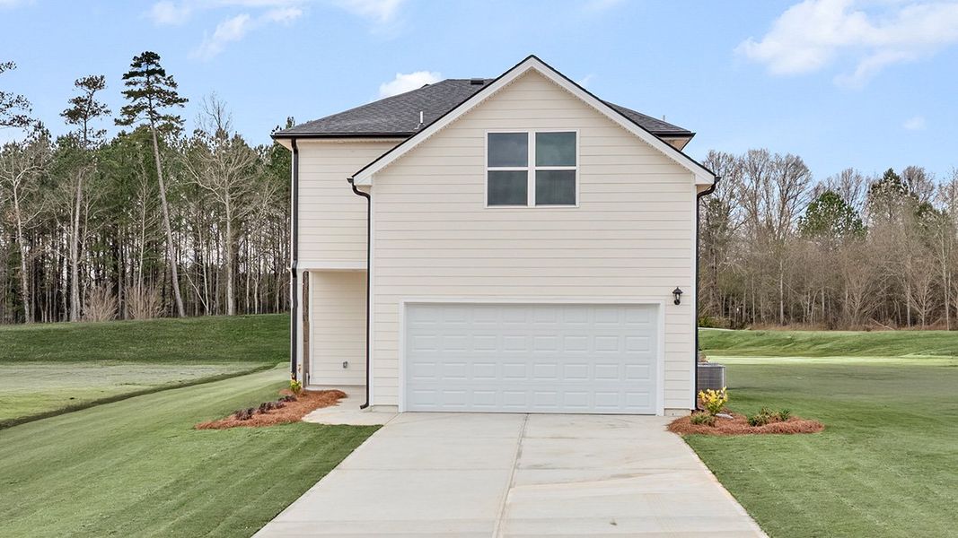 Front exterior of a home in the Brookland Commons community, located in Monroe, GA (Image 14).
