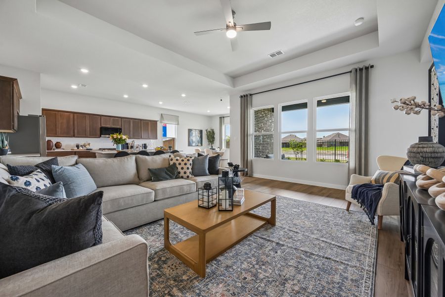 A living room with a large window.