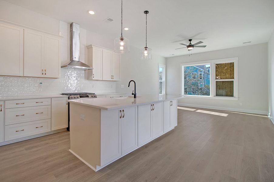 Furnished interior in a model home at Ferryboat Landing in Charleston (Image 6).