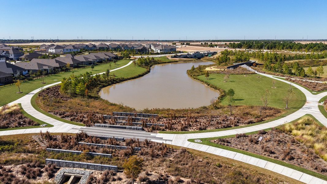 Aerial view of the Bridgeland Creekland Village community in Cypress, TX, showing layout and nearby surroundings (Image 1). Aerial view of the Bridgeland Creekland Village community in Cypress, TX, showing layout and nearby surroundings (Image 1).