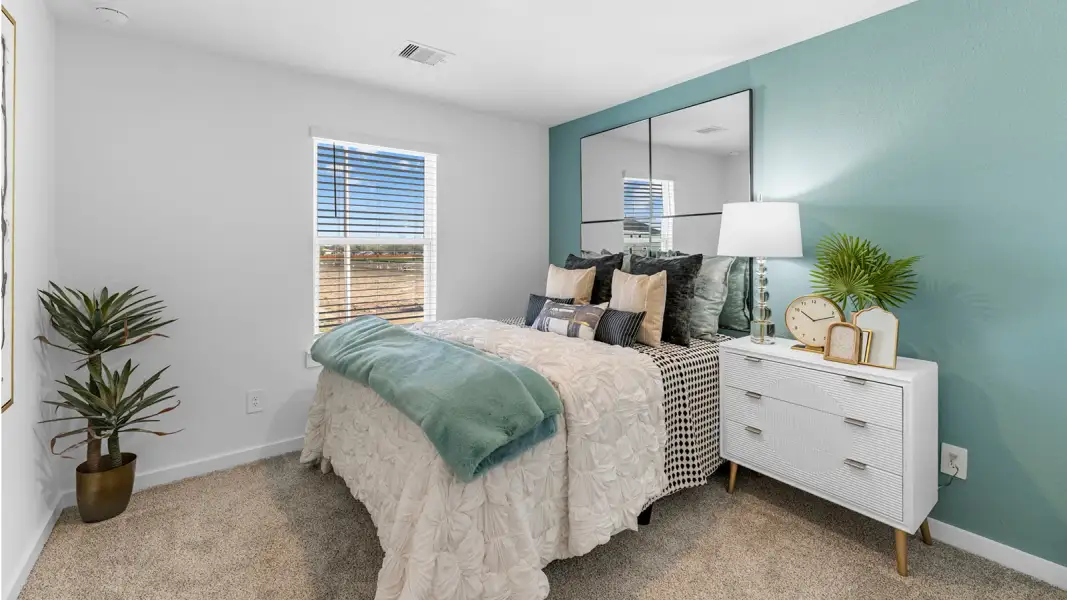Furnished interior in a model home at Alexander Townhomes in Pearland (Image 20).