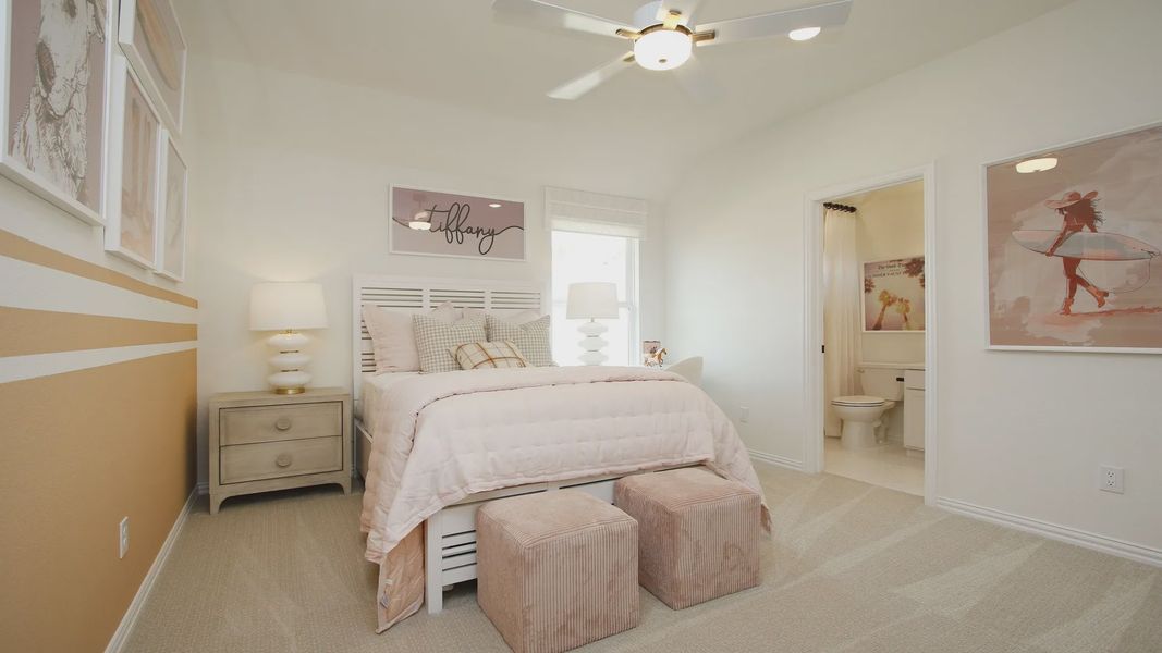 Elegant pastel tones and modern artwork elevate this Woodlands Hills bedroom's refined ambiance.